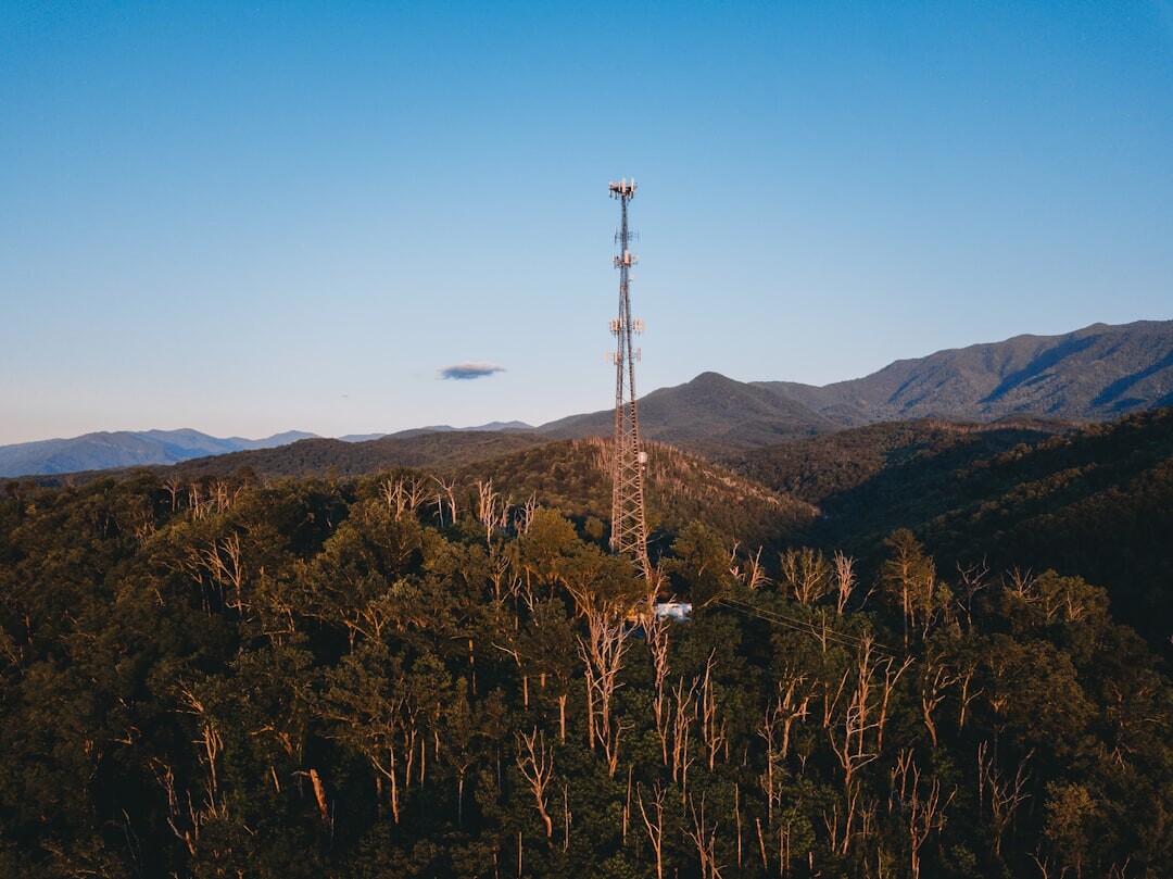 FM radio transmitter tower at sunset