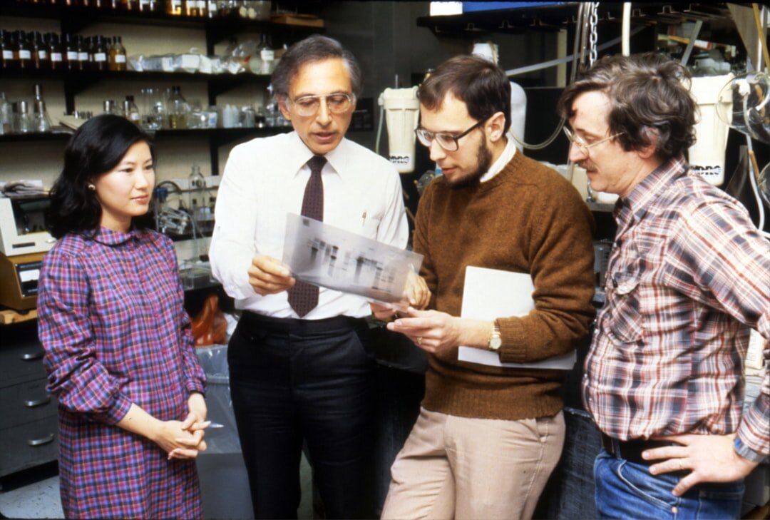 Media industry researchers analyzing trends with reports