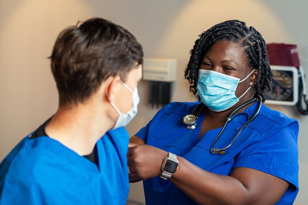 healthcare worker helping patient
