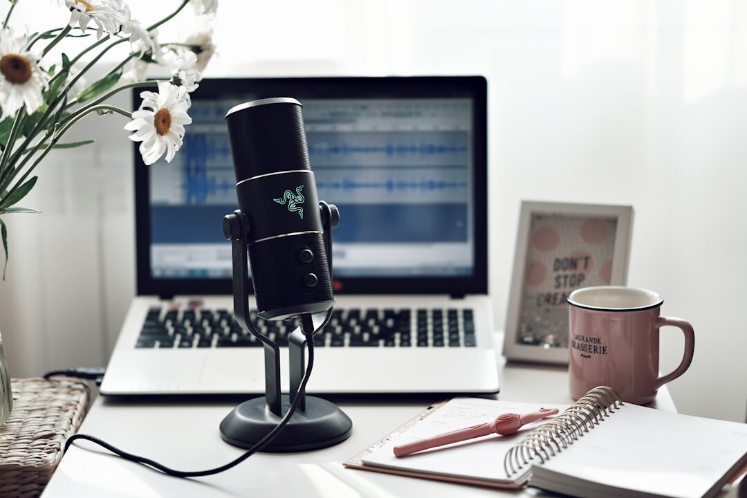 Thank you written with microphone on desk
