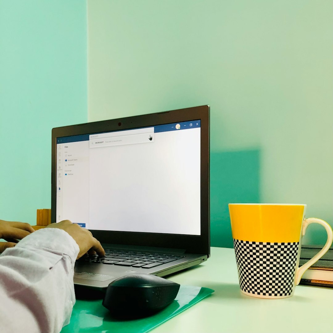 Journalist at computer writing media analysis article