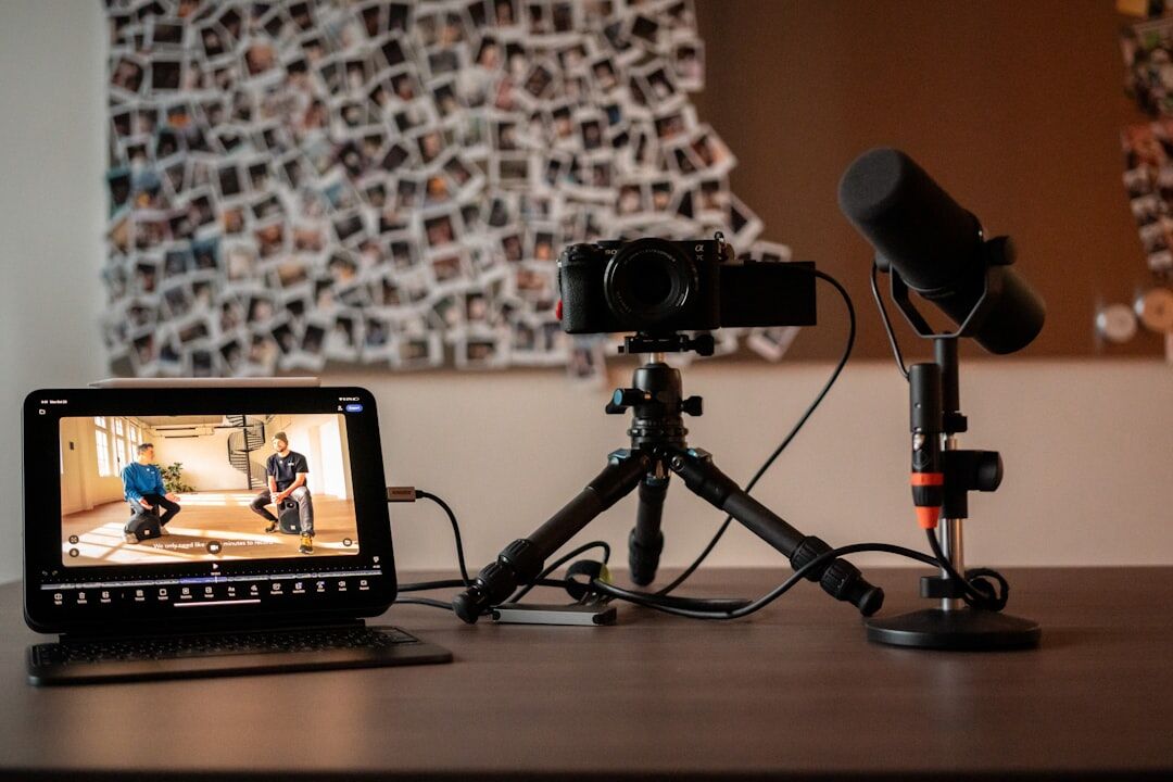 Two journalists conducting an interview in a recording studio